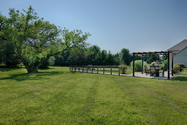 Outdoor space with seating arrangements and greenery