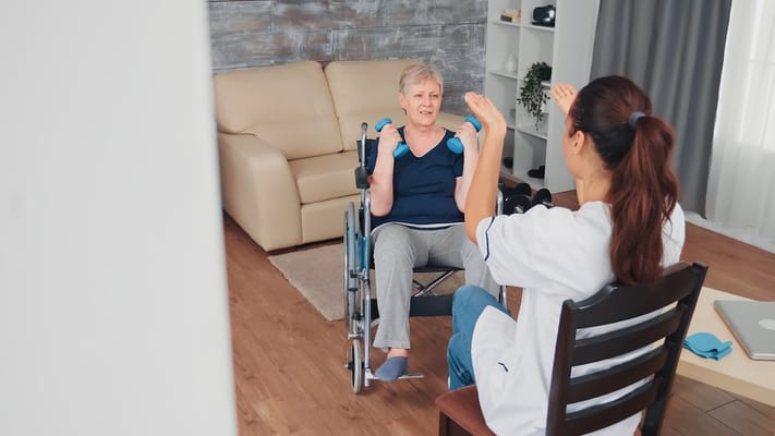 Caregiving session with resident in a cozy living area