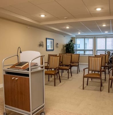 A common area with chairs arranged for an event