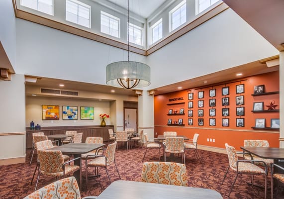 Bright common area with tables and chairs