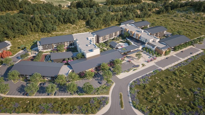 Aerial view of Enso Village campus with surrounding greenery