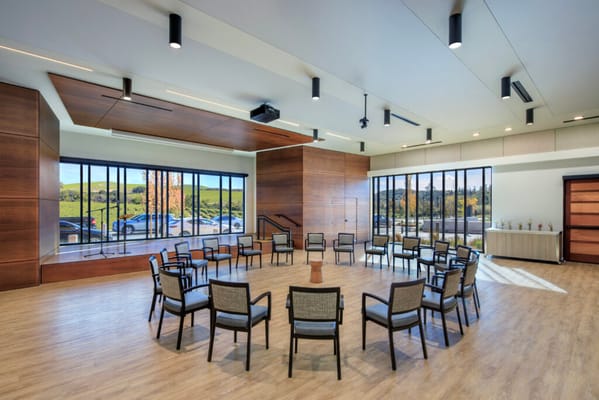 Bright common area with chairs arranged in a circle