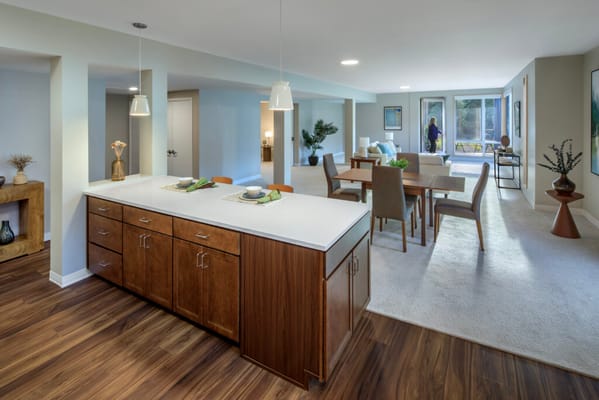 Bright common area with dining and living space