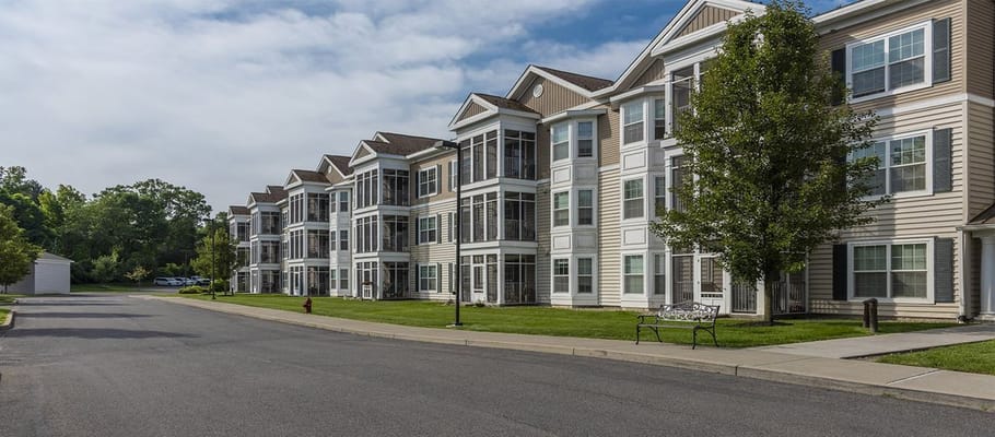 Exterior view of the building with landscaped grounds