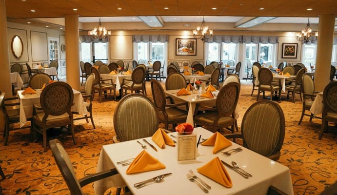 Dining room with tables set for a meal