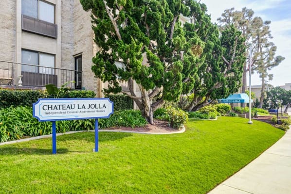 Exterior view of Chateau La Jolla with landscaped area