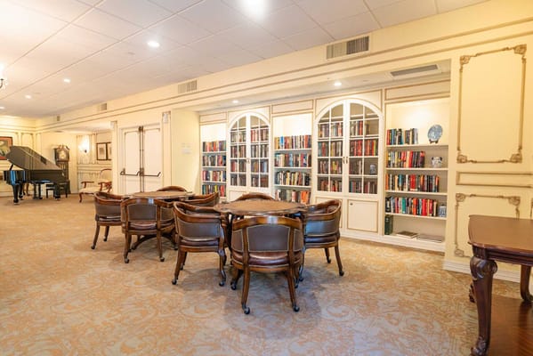 Common area with bookshelves and seating