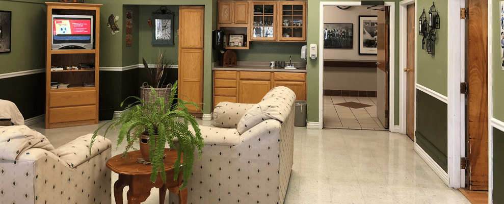 Common area with seating and kitchenette