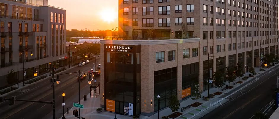 Exterior view of Clarendale Six Corners at sunset