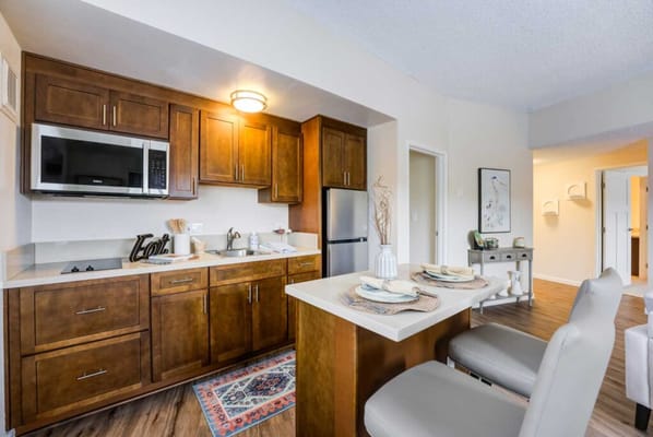 Bright kitchen area with modern appliances
