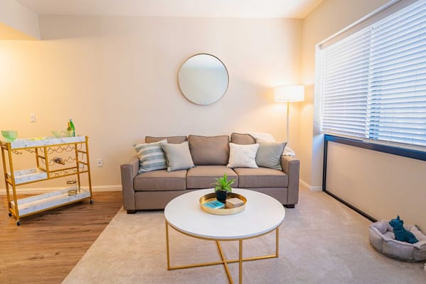 Inviting interior lounge area with a cozy couch and decor