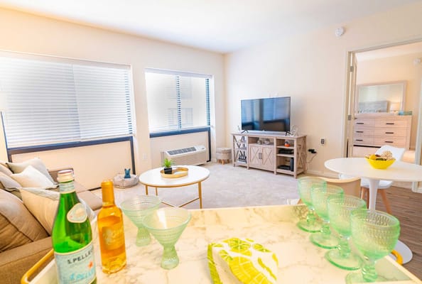 Bright interior of a resident's room with seating area