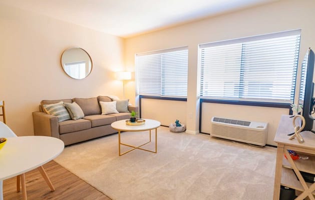 Bright common area with seating and decor