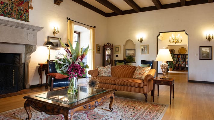 Cozy common area with seating and floral decor