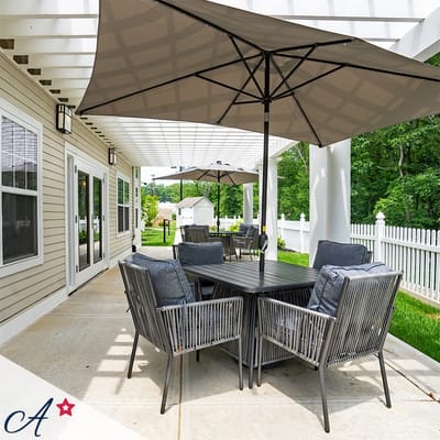 Outdoor seating area with umbrellas and tables
