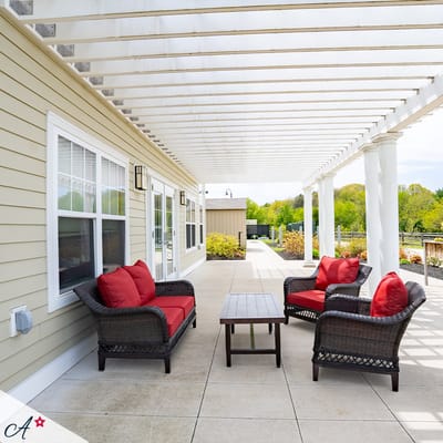 Patio seating area with comfortable chairs and table
