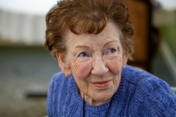 Close-up of an elderly woman smiling