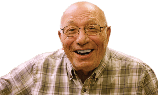 Smiling elderly man wearing glasses
