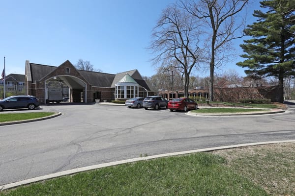 Exterior view of Manoogian Manor entrance and driveway