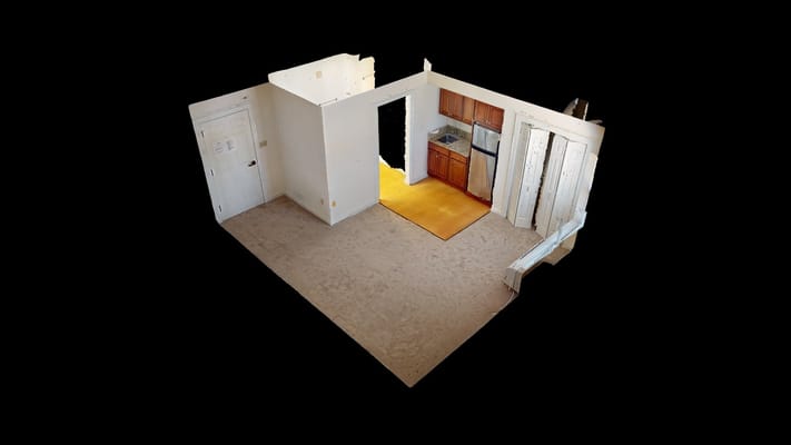 Apartment interior with kitchen area at Mennowood Retirement Community.