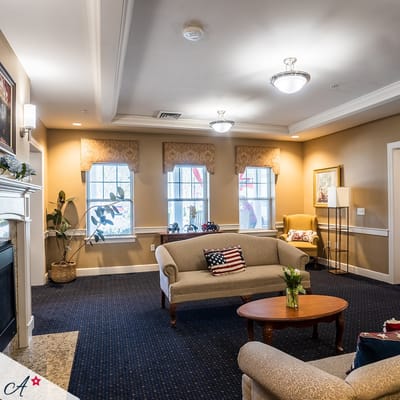 Cozy common area with seating and windows