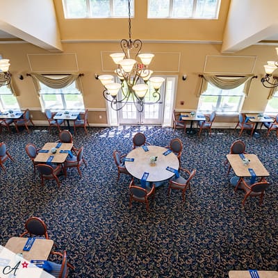 Interior dining area with tables and chairs
