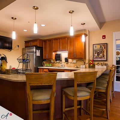 Interior view of a cozy kitchen area in a senior living facility