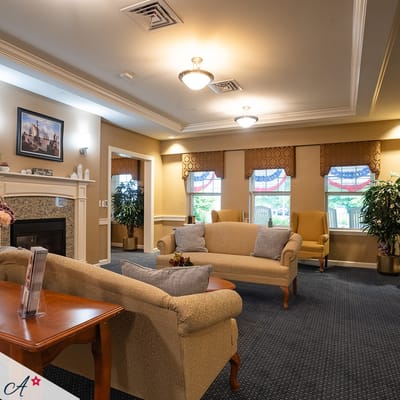 Cozy common area with seating and fireplace