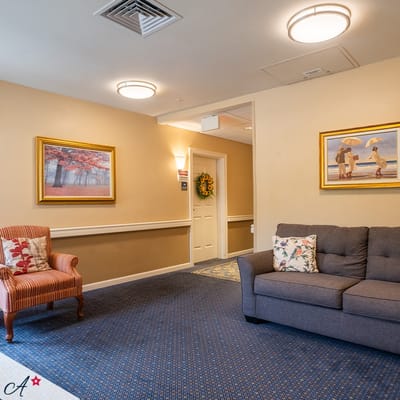 Cozy common area with seating and artwork