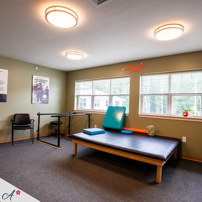 Therapy room with fitness equipment and natural light