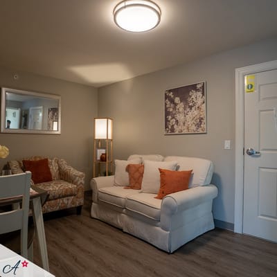 Cozy interior of a resident room with furniture and decor