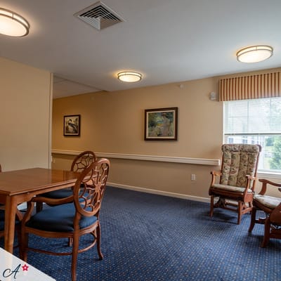 Cozy common area with comfortable seating and artwork