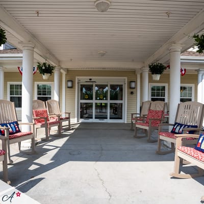 Outdoor seating area with rocking chairs on a porch