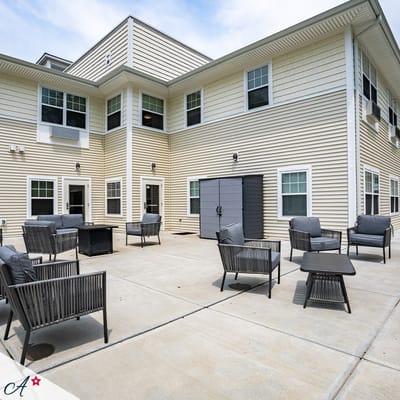 Outdoor seating area with chairs and tables