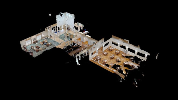 A 3D view of the living room and dining area with seating and tables.