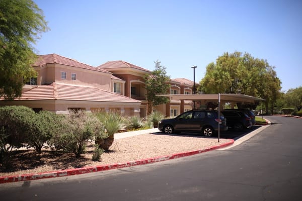 Exterior view of Atria Seville with parked cars