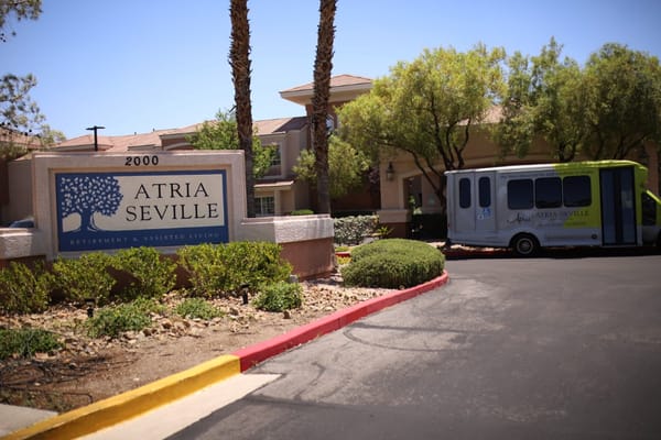Exterior view of Atria Seville with facility sign