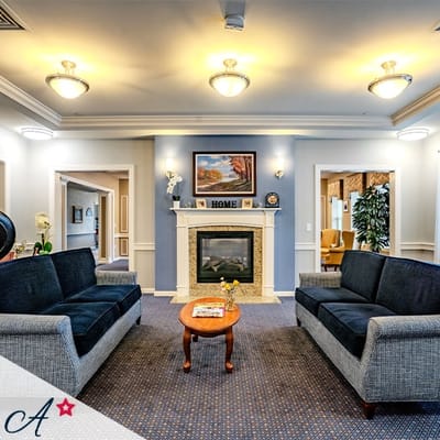 Cozy common area with seating and fireplace