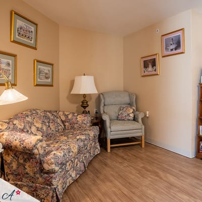 Cozy interior living space with floral furniture