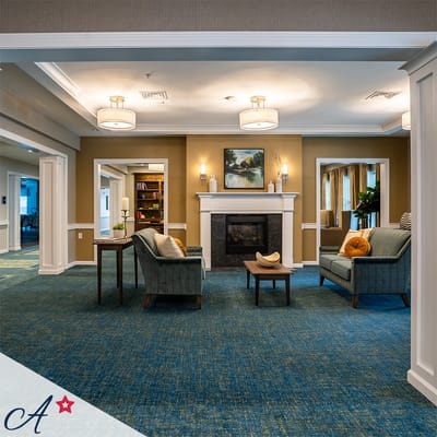 Cozy common area with seating and a fireplace