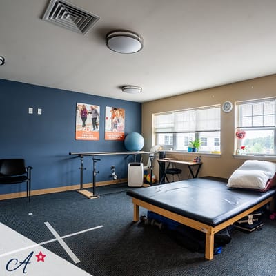 Interior view of a therapy room with equipment