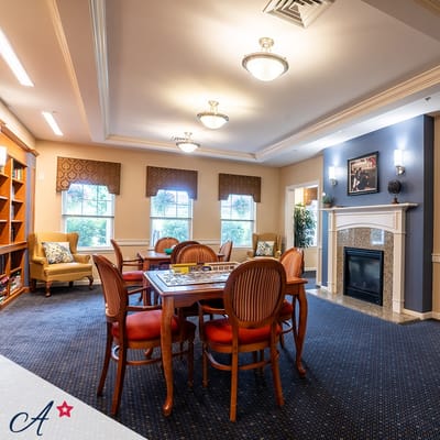 Common area with seating and bookshelves