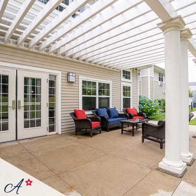 Patio area with outdoor seating and decor