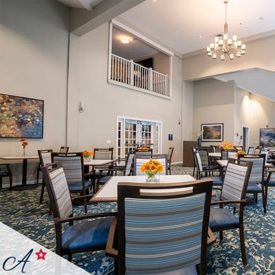 Bright lounge area with tables and chairs