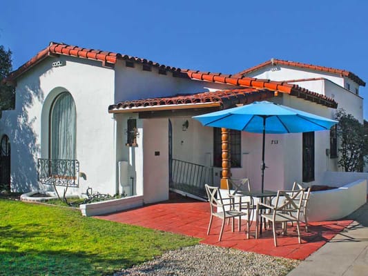 Exterior view of a residential facility with outdoor seating