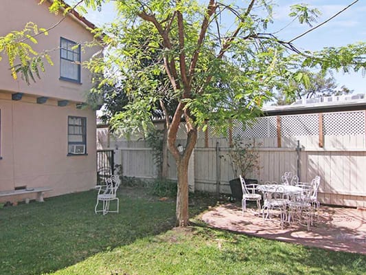 Garden area with seating and tree
