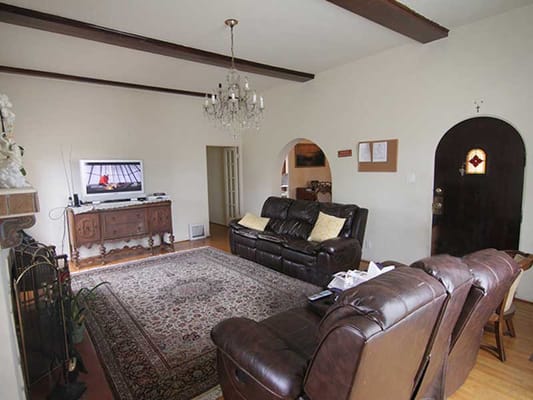 Cozy common area with seating and a chandelier