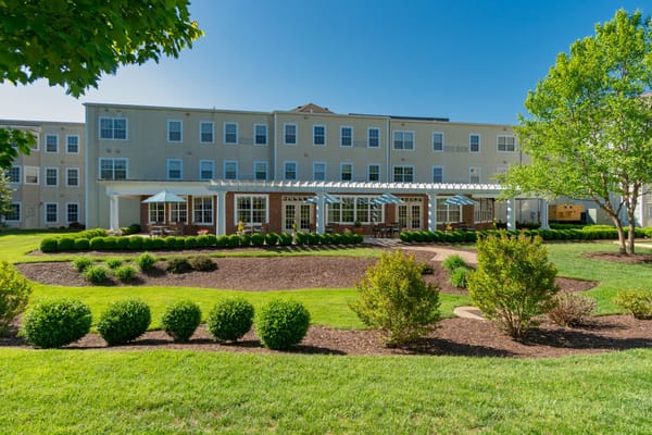 Exterior view of the garden and building at Bentley Commons