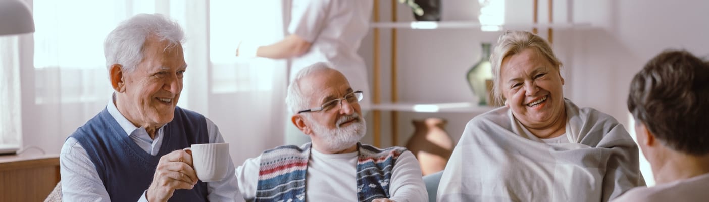 Group of smiling seniors in a common area
