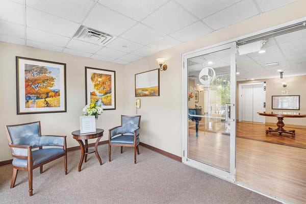 An inviting lounge area with artwork and seating